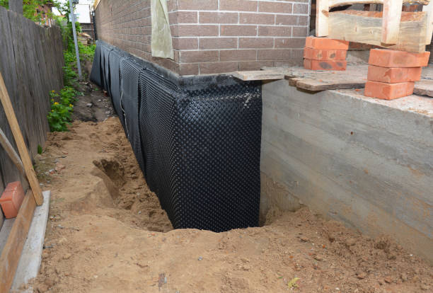 SJ Waterproofing Pros technician performing targeted Foundation Crack Repair assessment in Loudon, TN